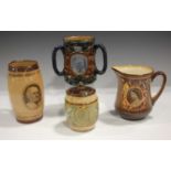 Four pieces of Doulton commemorative pottery, comprising a Nelson two-handled stoneware loving