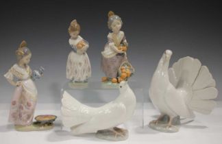 Three Lladro Valencian Girl figures, comprising No. 1422, No. 4841 and No. 5254, together with a