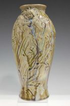 A Royal Doulton stoneware vase, decorated by Francis C. Pope, monogrammed, with a relief moulded