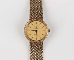 A Longines Quartz Presence 9ct gold lady’s bracelet wristwatch, the signed circular gilt dial with