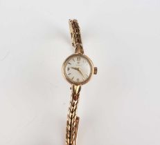 An Omega 9ct gold lady’s bracelet wristwatch, the jewelled movement detailed ‘Omega Watch Co 17