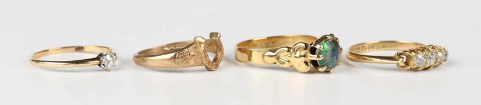 A gold ring, claw set with an old cut diamond, detailed ‘18’, ring size approx L1/2, an 18ct gold