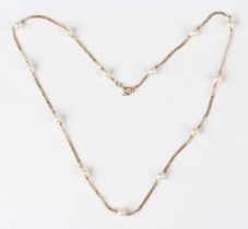 A 9ct gold and cultured pearl necklace, the curblink chain spaced with cultured pearls at intervals,