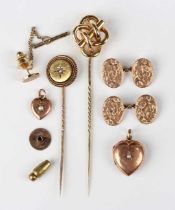 A gold stickpin in an entwined design, unmarked, weight 6.8g, another gold stickpin mounted with a