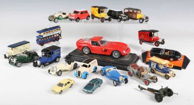 A collection of diecast vehicles, including Bburago Ferrari Testarossa, Tonka Polistil Porsche