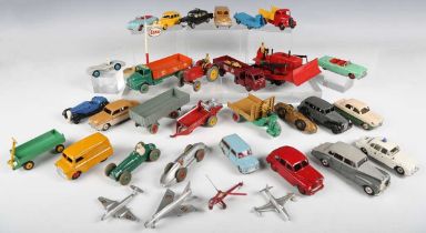 A collection of Dinky Toys cars, commercial vehicles, military aircraft and accessories, including