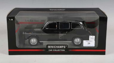 A Minichamps 1:18 scale London Taxi 1989, within a window box.