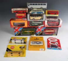 A collection of diecast model coaches, buses and other vehicles, including two Solido Routemaster