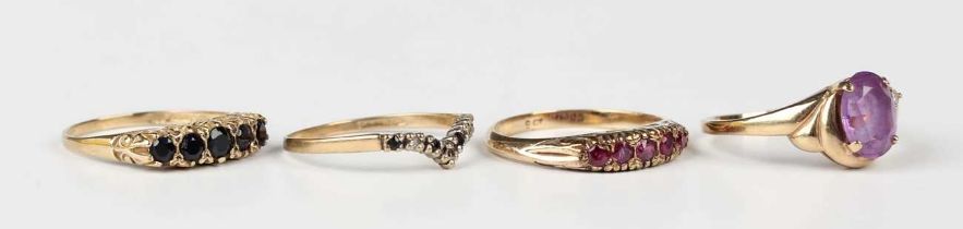 A 9ct gold and sapphire five stone ring, Birmingham 1989, ring size approx O1/2, a gold and ruby