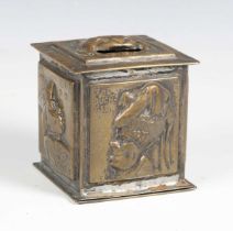 A late 19th/early 20th century Alice in Wonderland pressed brass novelty money box, probably