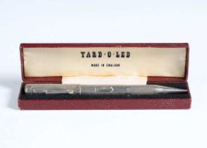 A silver cased combination fountain pen and propelling pencil, London 1938, the nib detailed 'De