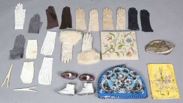 A mixed group of clothing and other textiles, including two pairs of infants' shoes, an Art Deco