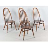 A set of four Ercol 'blue label' dark stained hoop back Windsor dining chairs, height 97cm, width