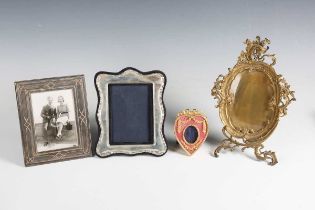 An early 20th century Rococo style gilt brass photograph frame with strut support, height 27cm,