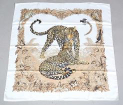 An Hermès 'Jungle Love' pattern silk scarf, designed by Robert Dallet, 90cm x 90cm, boxed.