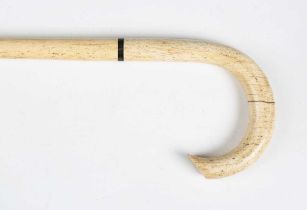 A 19th century scrimshaw whalebone walking stick with curved handle and inlaid baleen collar, length
