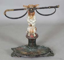 A 19th century cold painted cast iron stick and umbrella stand in the form of a begging dog