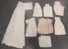 A group of mainly early 20th century infants' clothing, including two early 20th century silk and