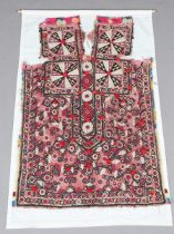 A Sindh Meghwal embroidered and mirrorwork tunic front, worked with overall foliage and with applied