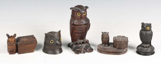 An early 20th century carved softwood novelty inkwell in the form of an owl, height 16cm, together