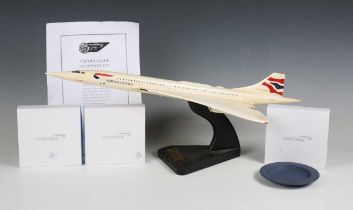 A British Airways 75th Anniversary scale model of a Concorde, length 60cm, together with three
