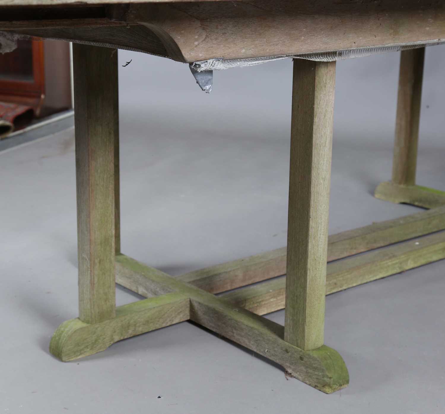 A late 20th century teak extending garden table by Gloster, height 70cm, extended length 310cm, - Image 5 of 20