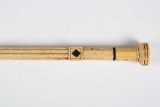 A 19th century scrimshaw whalebone walking cane with spiral reeded, ring turned and reeded