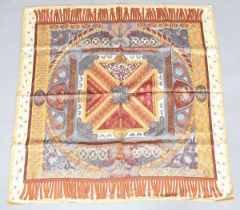 An Hermès 'Sur un Tapis Volant' pattern silk scarf, designed by Annie Faivre, 90cm x 90cm, within