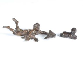 A late 19th century Continental cast bronze figure of a boy catching two ducks, length 15cm,