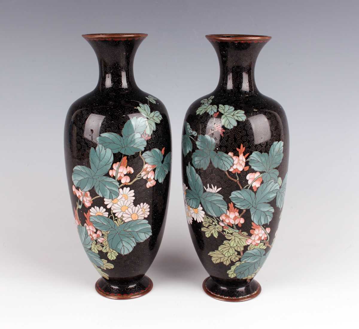 A pair of Japanese cloisonné vases, Meiji period, each elongated ovoid body decorated with flowering