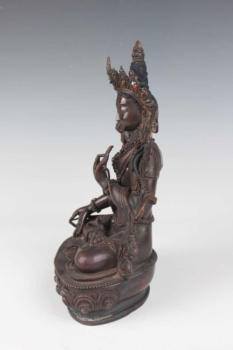 A Sino-Tibetan brown patinated copper alloy figure of Tara, 20th century, modelled seated in - Image 7 of 9