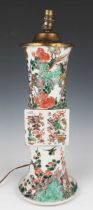 A Chinese famille verte archaistic gu-form porcelain vase, Kangxi period, the panelled square mid-