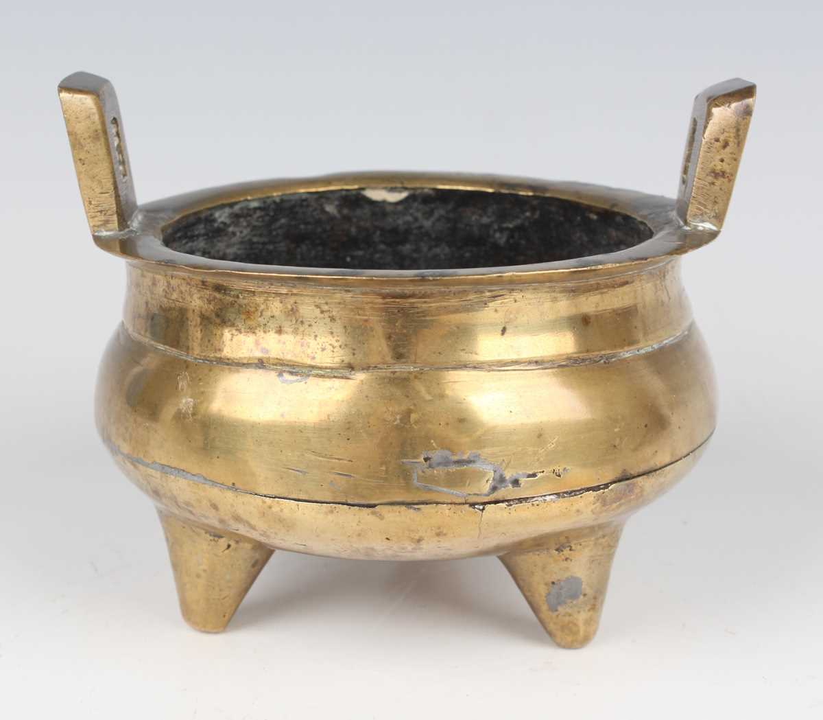 A Chinese brown patinated bronze tripod censer, Qing dynasty, of low-bellied circular form on - Image 9 of 14