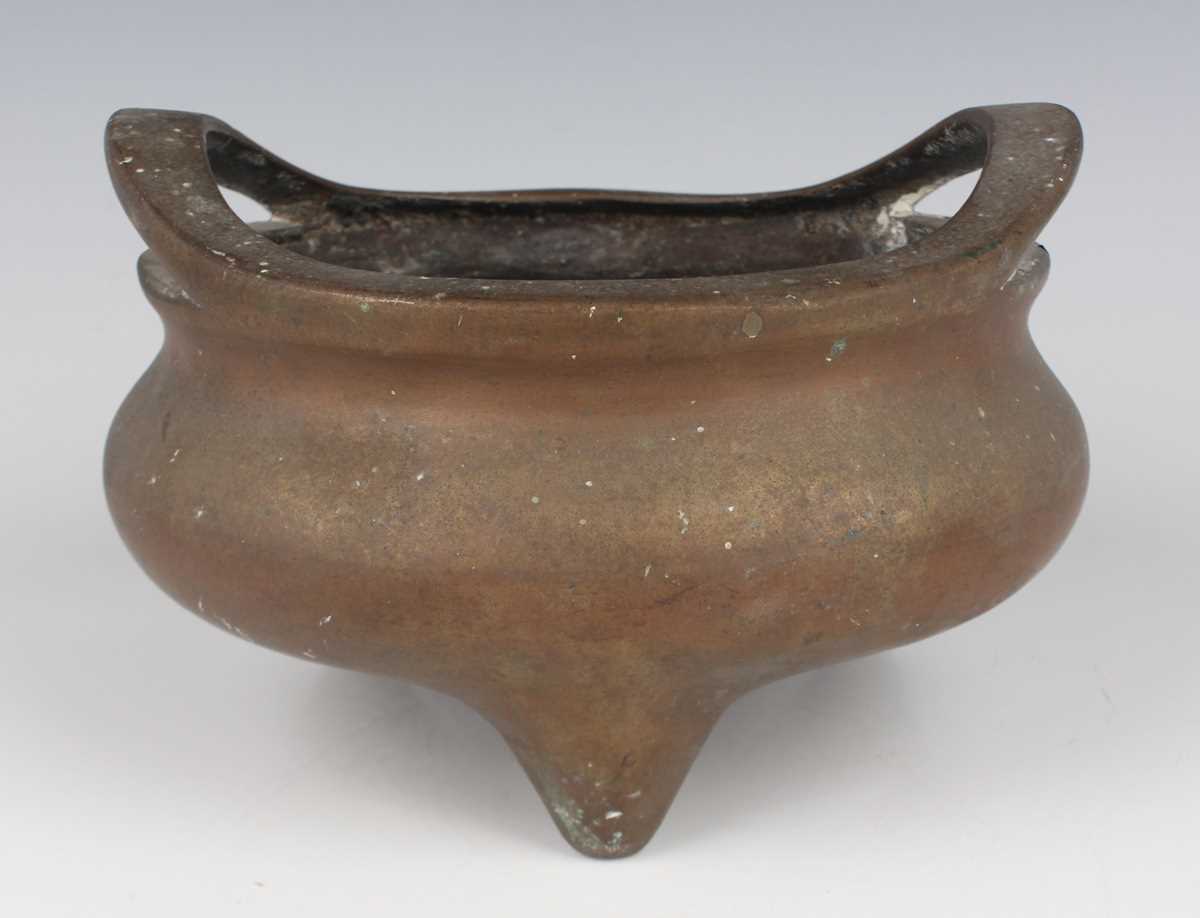 A Chinese bronze bombé censer, 19th/20th century, of low-bellied circular form with a pair of loop - Image 3 of 7