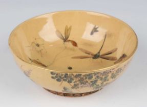 A Japanese Satsuma earthenware circular bowl, Meiji period, the interior painted with toad,