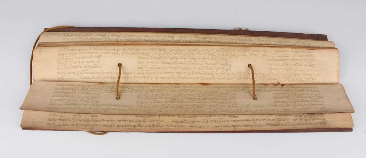 A Burmese palm leaf manuscript, late 19th century, comprising twenty-nine leaves of Sanskrit script, - Image 3 of 16