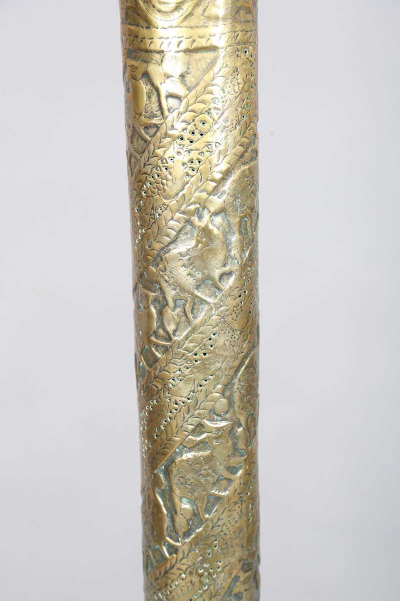 An Islamic brass floor lamp, circa 1900, the flared surmount and cylindrical column decorated with - Image 21 of 24