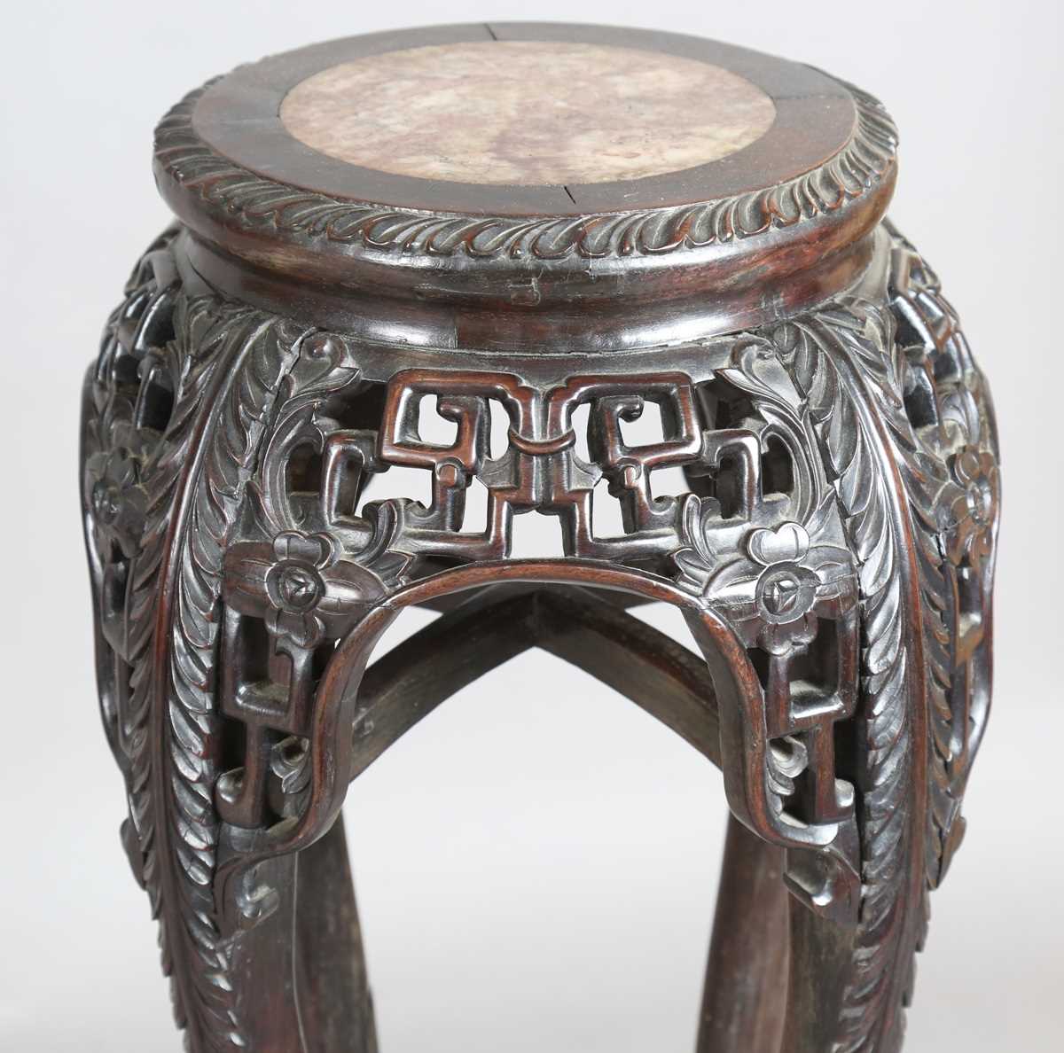 A Chinese hardwood jardinière stand, late 19th century, the circular top inset with a rouge marble - Image 12 of 17