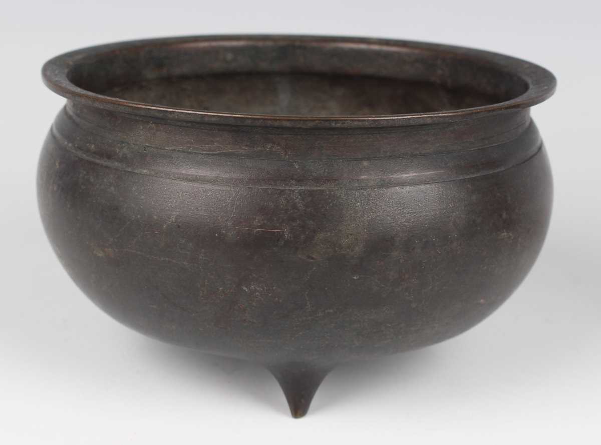 A Chinese brown patinated bronze tripod censer, Qing dynasty, of low-bellied circular form on - Image 5 of 14