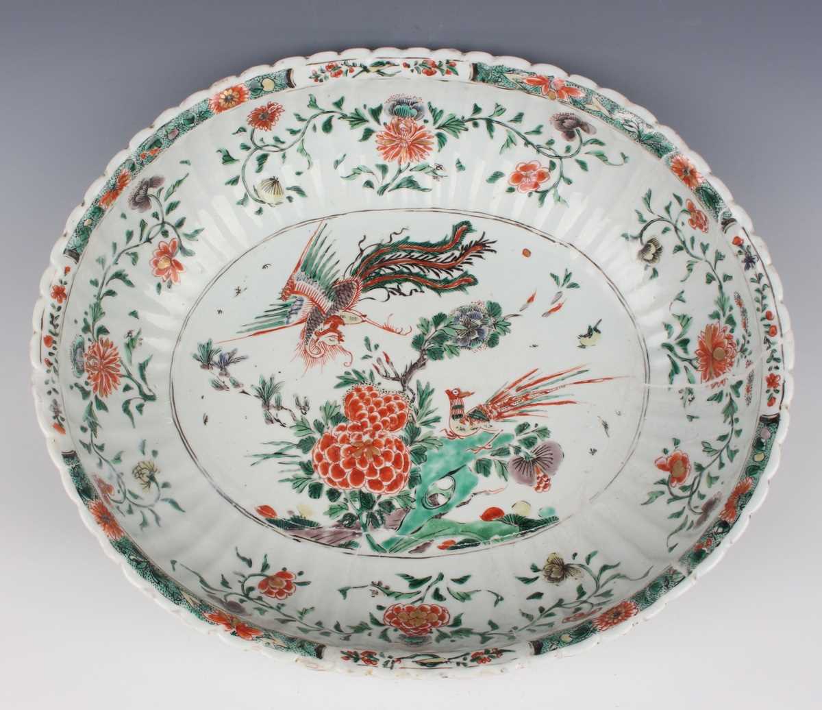 A Chinese famille verte export porcelain bowl, Kangxi period, of fluted oval form, the interior - Image 2 of 20