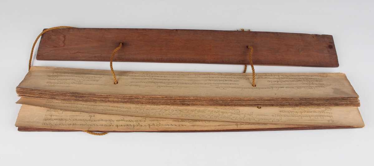 A Burmese palm leaf manuscript, late 19th century, comprising twenty-nine leaves of Sanskrit script, - Image 6 of 16