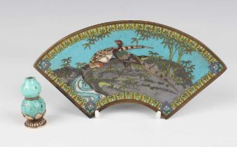 A Chinese cloisonné fan shaped panel, late Qing dynasty, decorated with a pair of pheasants,