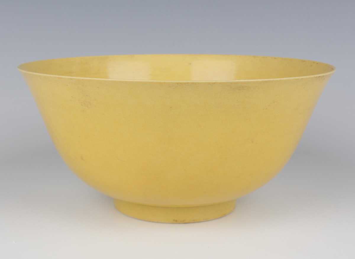 A Chinese yellow glazed porcelain bowl, mark of Chenghua but probably later, of finely potted