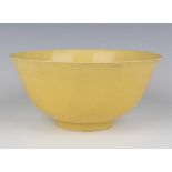 A Chinese yellow glazed porcelain bowl, mark of Chenghua but probably later, of finely potted