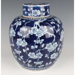 A Chinese blue and white porcelain ginger jar and cover, late 19th century, of stout ovoid form,