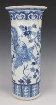 A Chinese blue and white porcelain cylinder vase, late 19th century, painted with a pair of