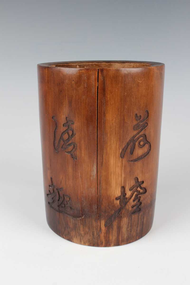 A Chinese bamboo brushpot, 20th century, the exterior carved in low relief with lotus opposing - Image 3 of 10