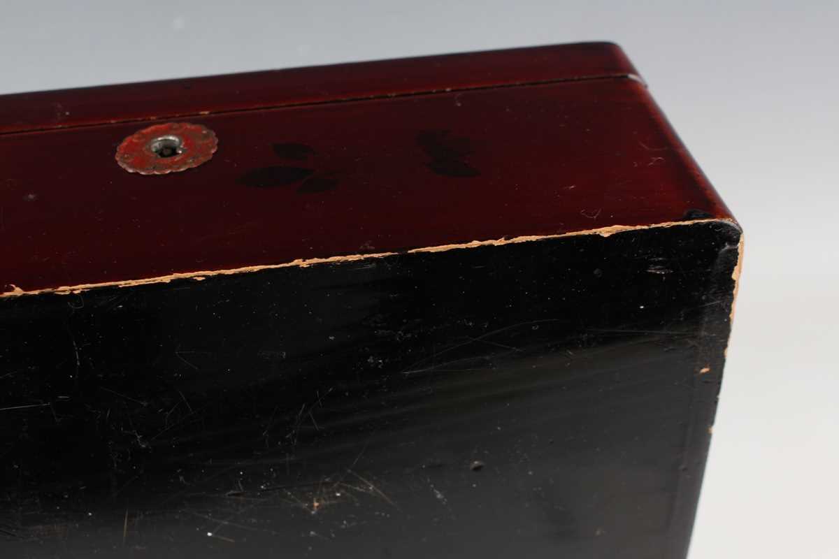 A Chinese red lacquer three-tier box with overhead handle, late 19th/early 20th century, decorated - Image 34 of 46