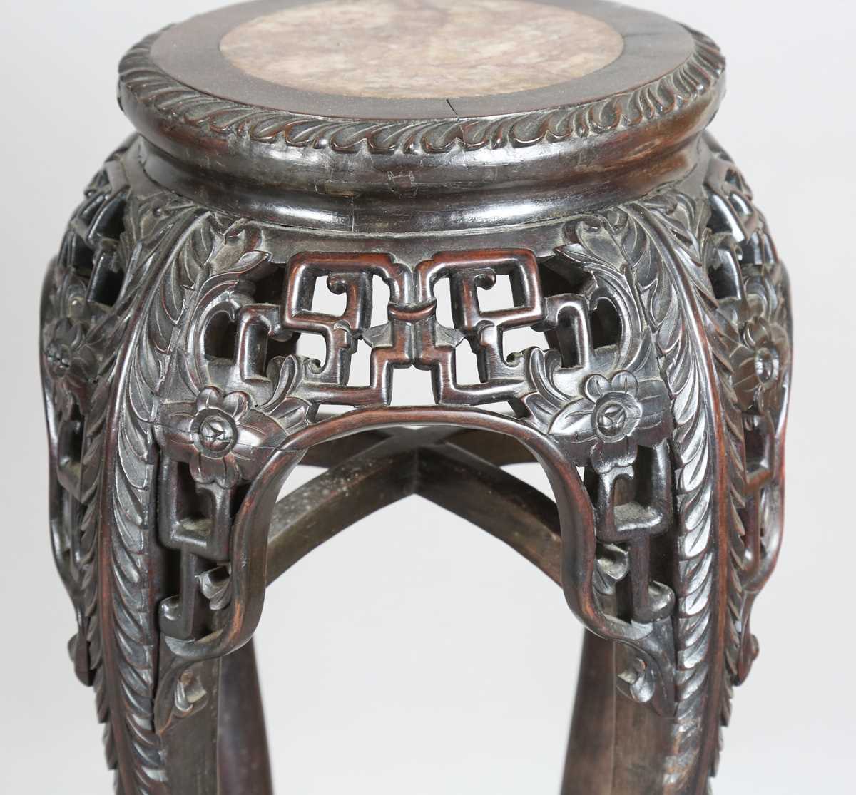 A Chinese hardwood jardinière stand, late 19th century, the circular top inset with a rouge marble - Image 6 of 17