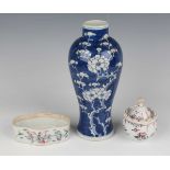 A Chinese blue and white porcelain vase, late 19th/early 20th century, of slender baluster form,